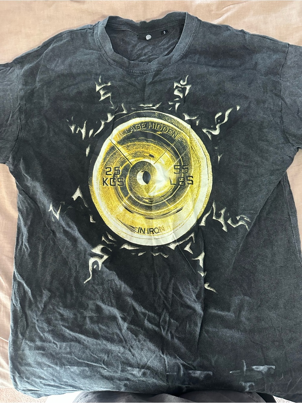 Village Hidden In Iron Naruto Men's Black Graphic T-Shirt with Yellow Disc Print